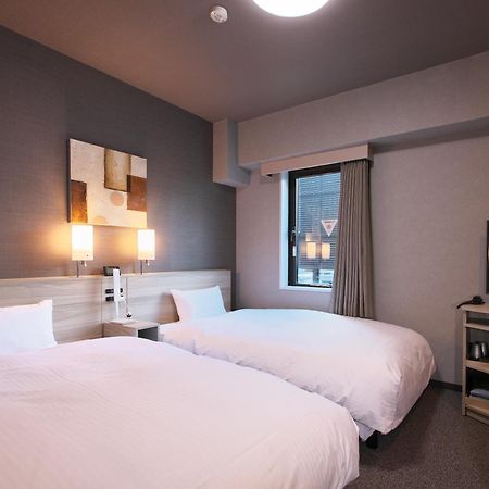 Hotel Route-Inn Toyama Ekimae Екстер'єр фото